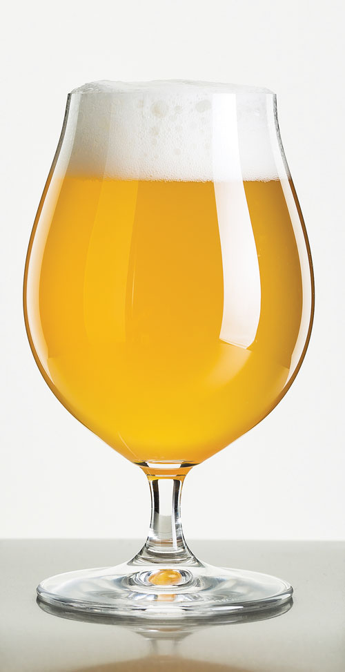 a golden colored pale ale beer with a white head and a slight haze to it in a stemmed tulip glass
