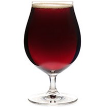 Full snifter glass of dark ale or porter beer isolated on white background