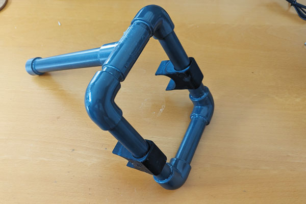 PVC piping makes up the unpressurized support base that holds the keg up