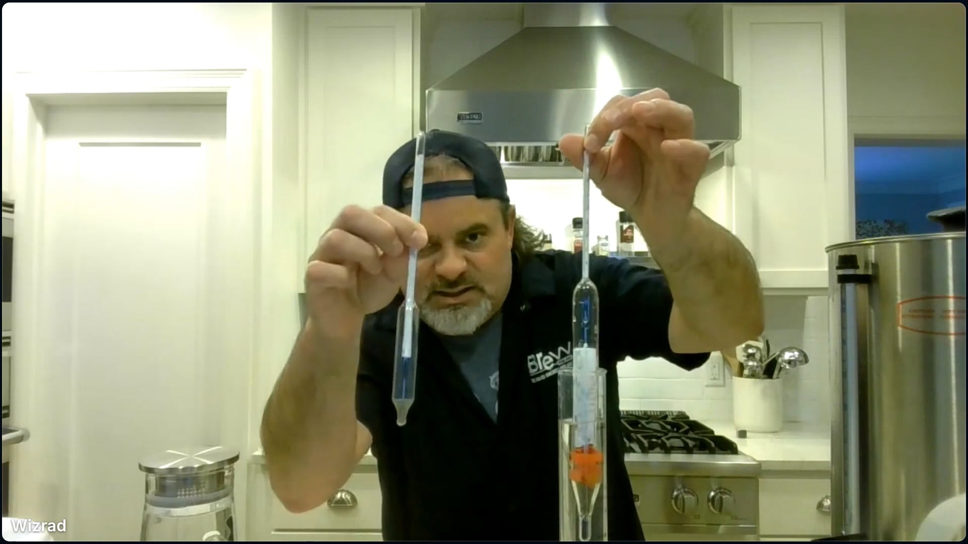 Man demonstrates how to use a hydrometer.