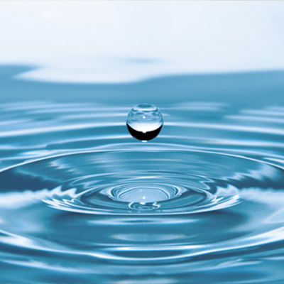 water droplet hovering above a pool